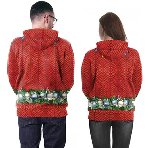 Matching Christmas hoodies with 3D festive prints and red knit textures for couples