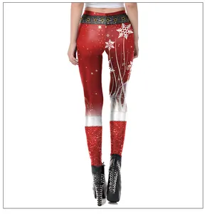 Rear view of Christmas leggings featuring snowflake prints and a black belt pattern