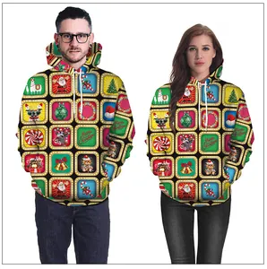 Detail view of the festive digital print on a yellow and black Christmas hooded sweatshirt