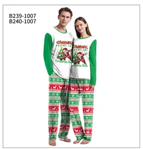 Christmas couple pajamas set with Santa print and Fair Isle pattern pants in studio shot