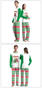 Detailed view of couple Christmas pajamas set with Santa print and fair isle trousers