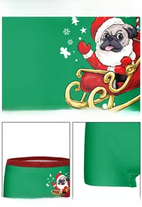 Detail of Christmas pug print boxer shorts featuring elastic waist and loose leg design