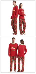 Detailed view of red Christmas pajama set with reindeer print and comfortable elastic waist
