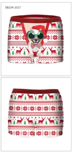 Detailed Christmas boxer briefs featuring festive dog prints and red glitter waistband