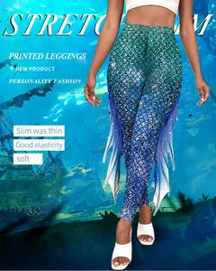 Détail de nageoire de sirène 3D sur un legging imprimé écailles de poisson dégradées