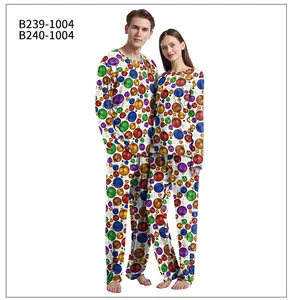 Couples Christmas pajamas set featuring colorful holiday ornament prints on white fabric