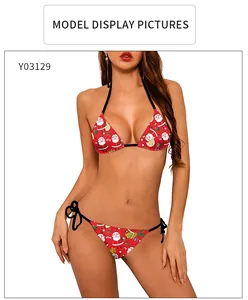 Details des roten Weihnachts-Bikinis mit Weihnachtsmann-Prints und seitlichen Bindebändern