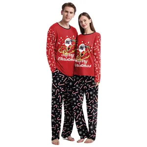 Christmas pajama set for couples featuring red dog print tops and snowflake pattern pants