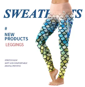 Detail of fish scale digital print yoga leggings with starfish and seashell patterns