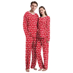 Christmas couple pajama set with festive red HO HO HO prints and snowflake patterns