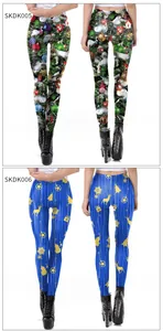 Detail view of high elastic Christmas leggings featuring festive tree and snowflake patterns