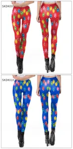 Detail view of red and blue Christmas leggings with colorful light bulb pattern