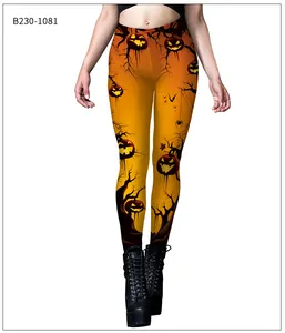 Detail of Halloween leggings with orange pumpkin and bat prints paired with black boots