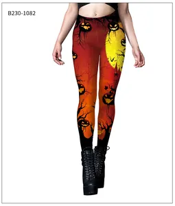 Close-up of Halloween theme leggings featuring pumpkin, castle, and bat print details