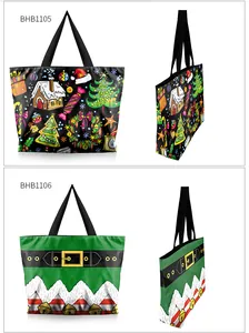 Detailansicht großer Weihnachts-Canvas-Taschen mit festlichen Haus- und Elfenmotiven