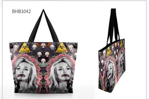 Detail view of surrealist canvas tote with starry hot air balloon and pop art female print