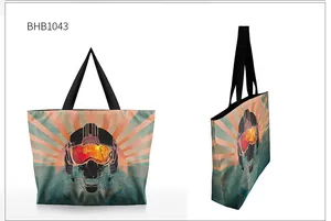Detail view of printed tote bag showing pilot skull pattern and durable black strap