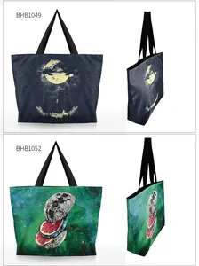 Detail view of large tote bags with surreal starry sky and moon digital prints