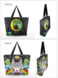 Detail view of printed tote bags featuring starry moon and artistic rainbow cat motifs