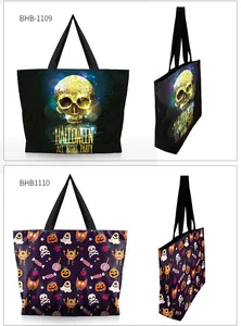 Detail view of two Halloween themed tote bags with skull and pumpkin digital prints
