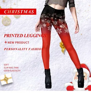 Detail of Christmas leggings featuring festive snowflake prints and red gradient design