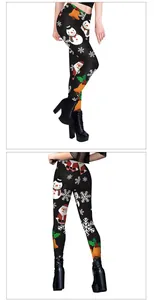 Detailed view of high-waist Christmas leggings featuring colorful snowman and Santa prints