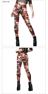 Detail of Christmas leggings featuring festive dog prints with red holiday hats