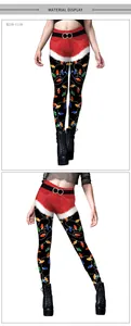 Detail of Christmas leggings with Santa belt print and colorful festive light patterns