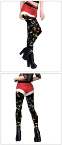 Detail of Christmas leggings featuring Santa belt waist and colorful string lights print
