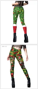 Close-up of Christmas leggings with digital pine needles and holiday ornaments print