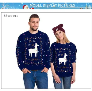 Detail of blue Christmas sweatshirt showing the llama print and FA-LA-LA-LA text on fabric