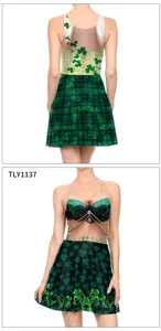 Front and back view of St. Patrick's Day dress featuring shamrock prints and Good Luck text