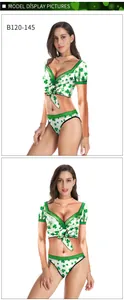 Detail view of Saint Patrick's Day two-piece swimsuit with green clover prints and tie-up front