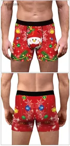 Front and back view of men's red Christmas boxer briefs with snowman and snowflake prints
