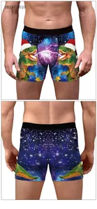Detailed view of men's blue boxer briefs with Christmas dinosaurs and starry sky print