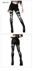 Detail of gothic punk yoga leggings with white skull prints and artistic lettering design