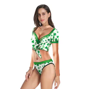 Women's two-piece St. Patrick's Day outfit with green shamrock print and tie-up top