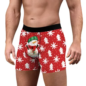 Men's red Christmas boxer briefs featuring festive snowman print and Merry Christmas text