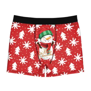 Red Christmas boxer briefs featuring festive snowman print and Merry Christmas text