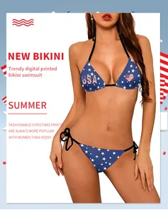 Detail of USA-themed bikini with navy blue star pattern and adjustable black side ties
