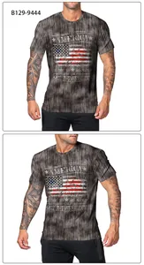 Close-up of vintage American flag print and patriotic text on a dark gray men's T-shirt