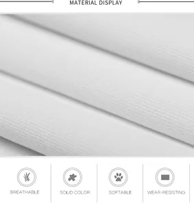 Detail of breathable white fabric showing soft texture and wear-resistant material quality