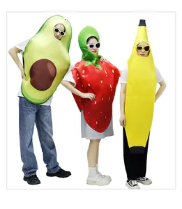 Three people posing in avocado, strawberry, and banana fruit cosplay party costumes