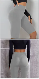 Vue latérale et arrière d'un short de yoga gris sans couture à taille haute gainant