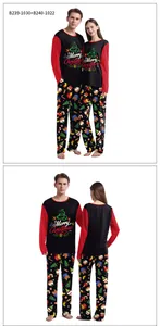 Close-up of Merry Christmas print and festive pattern on long sleeve pajama sets