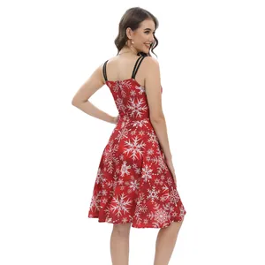 Women's red Christmas dress with white snowflake prints and thin black shoulder straps