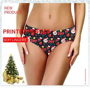 Close-up of women's Christmas print panties featuring Santa Claus and JOY lettering