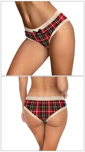 Detail of tartan pattern women's Christmas panties with elegant white lace trim and bow