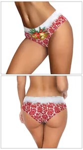 Detail der Weihnachtsunterhose mit rotem Spitzenmuster und festlichem Glockendruck