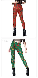 Close-up of high-waist Christmas leggings with festive reindeer and gift prints